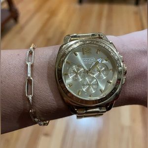 Coach authentic gold tone watch